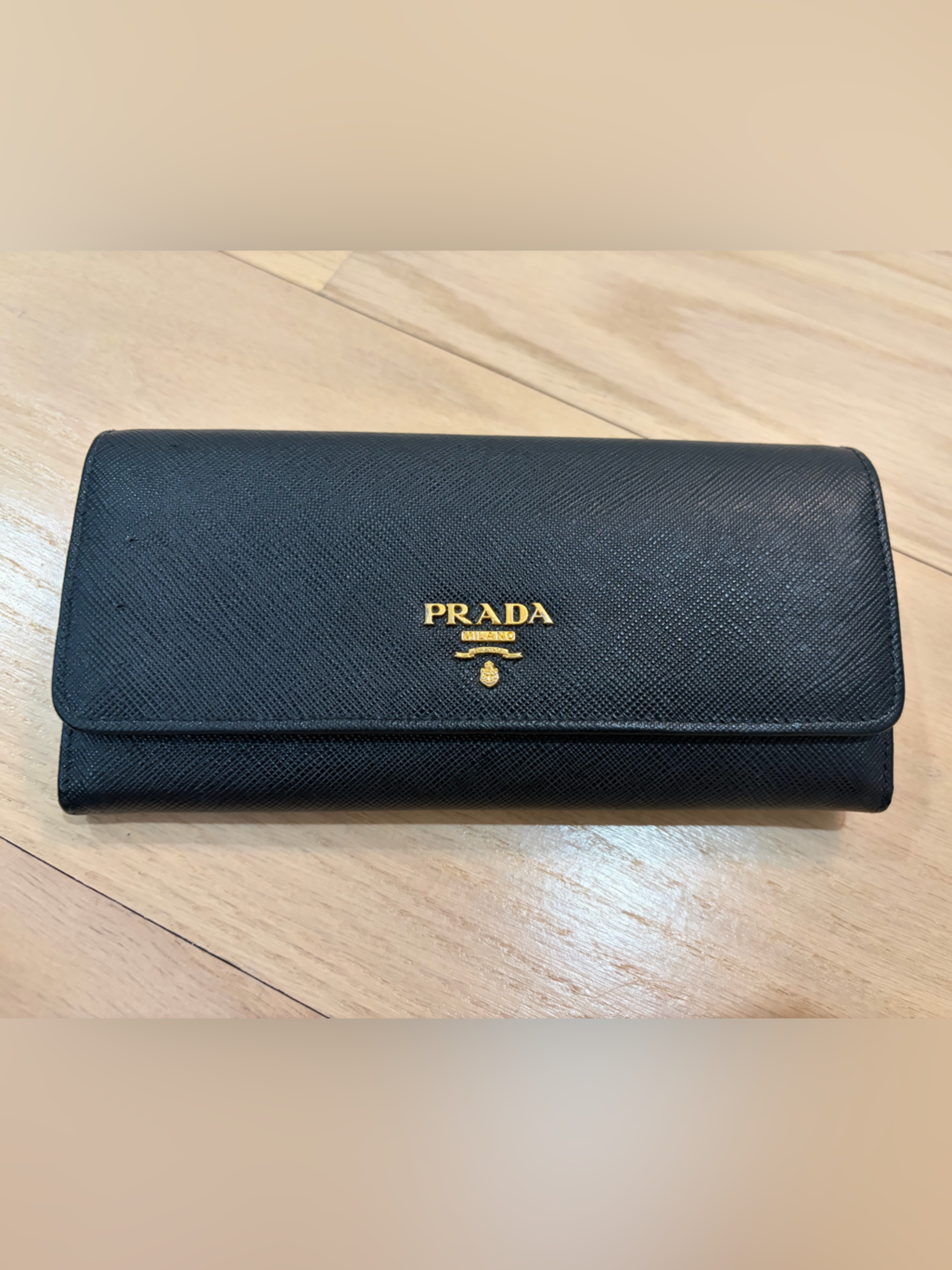 Prada Black Saffiano Leather Trifold Wallet With Gold Logo